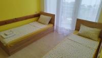 Postel nebo postele na pokoji v ubytování Family Hotel Kentavar 2