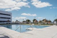 Bazén v ubytovaní Residencial Celere Playa Niza alebo v jeho blízkosti