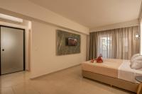 Posteľ alebo postele v izbe v ubytovaní Castro Beach Hotel