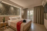 Posteľ alebo postele v izbe v ubytovaní Castro Beach Hotel