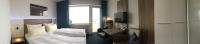 Hotel Quisisana & Appartements Quisiにあるベッド