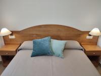 Postel nebo postele na pokoji v ubytování Apartamentos Marsil