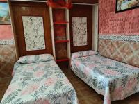 A bed or beds in a room at Apartamentos Matraca
