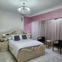 Postel nebo postele na pokoji v ubytování Unique Apartment in Sheraton Heliopolis