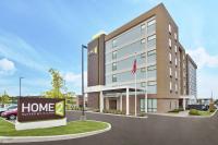 un edificio con una señal de casa delante de él en Home2 Suites By Hilton Pittsburgh Area Beaver Valley, en Monaca