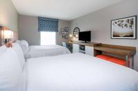 Ein Bett oder Betten in einem Zimmer der Unterkunft Hampton Inn &amp; Suites Glenarden&#47;Washington DC