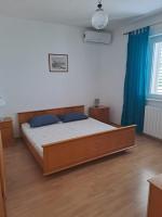 Posteľ alebo postele v izbe v ubytovaní Apartments with a parking space Brela, Makarska - 18495