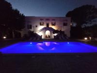 The swimming pool at or close to MASSERIA INCANTAMENTO Suite Bouganville