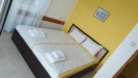 Postel nebo postele na pokoji v ubytování Family Hotel Kentavar 2