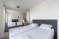 A bed or beds in a room at Studio cosy, 4Pers, wifi, proche Disney, Parking - Fairytale Factory
