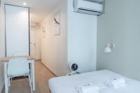 Łóżko lub łóżka w pokoju w obiekcie Lavie Maison Paris AC Retreat