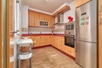Kuchyň nebo kuchyňský kout v ubytování Vivienda con piscina