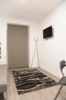 A television and/or entertainment centre at Comodo y agradable estudio en Madrid centro A5