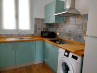 Kuchyňa alebo kuchynka v ubytovaní Apartamentos Cala San Pedro