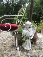 Vonkajšia záhrada v ubytovaní Au Pain des Anges