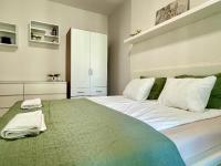 Posteľ alebo postele v izbe v ubytovaní Marina Panorama Apartment & Garage