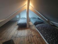 Posteľ alebo postele v izbe v ubytovaní Maison avec 4 chambres au centre de st Valéry