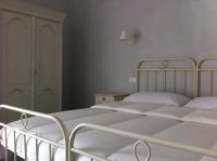 Posteľ alebo postele v izbe v ubytovaní Skipper White Guest House