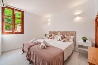 Posteľ alebo postele v izbe v ubytovaní Ca Na Luisa-Residential Area