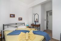 Posteľ alebo postele v izbe v ubytovaní Apollon Rooms