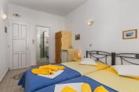 Posteľ alebo postele v izbe v ubytovaní Apollon Rooms