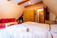 Postel nebo postele na pokoji v ubytování Hotel Sluníčko