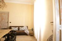 A bed or beds in a room at Ai due Mori Apt by Addler House Ospitality