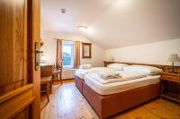 Postel nebo postele na pokoji v ubytování Hotel Sepetná