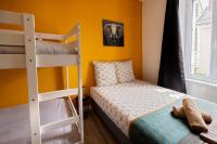 Łóżko lub łóżka w pokoju w obiekcie LD-Location Hôtel