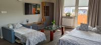 Łóżko lub łóżka w pokoju w obiekcie Hotel 107