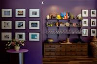 a purple room with a wooden dresser and a purple wall at The Exchange Sacramento, Curio Collection By Hilton in Sacramento