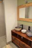 a bathroom with two sinks and a mirror at Maison Amandre en Pleine Nature - Mas Lou Castanea in Collobrières