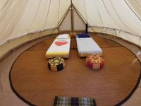 a group of three beds in a tent at Maison Amandre en Pleine Nature - Mas Lou Castanea in Collobrières