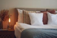 Hotel Szlak Bursztynowyにあるベッド