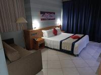 Posteľ alebo postele v izbe v ubytovaní Green Hotel Ninfa