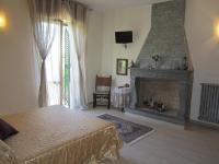 Posteľ alebo postele v izbe v ubytovaní B&B Al Calcandola