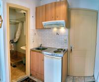 Kuchyň nebo kuchyňský kout v ubytování Angelos Rooms