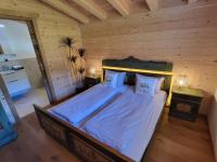 Posteľ alebo postele v izbe v ubytovaní Schickster Sky Lodge