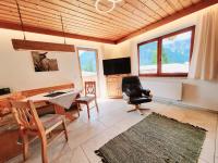 Televízia a/alebo spoločenská miestnosť v ubytovaní Schickster Sky Lodge