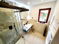 Kúpeľňa v ubytovaní Schickster Sky Lodge