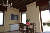 Telewizja i/lub zestaw kina domowego w obiekcie Locanda La Sosta