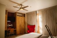 Postel nebo postele na pokoji v ubytování Billini Hotel, Historic Luxury