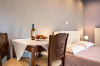 A bed or beds in a room at Ionian Balcony 2