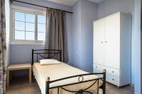 A bed or beds in a room at Ionian Balcony 2