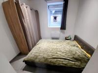 Una cama o camas en una habitaci&oacute;n de Le Havre - appartement cosy - Avec Netflix