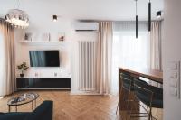 TV a/nebo společenská místnost v ubytování Pure Rental Apartments Inżynierska