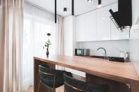 Kuchyň nebo kuchyňský kout v ubytování Pure Rental Apartments Inżynierska