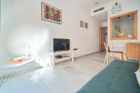Televízia a/alebo spoločenská miestnosť v ubytovaní APARTAMENTO EN EL CENTRO, TRANQUILO Y LUMINOSO