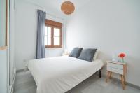 Posteľ alebo postele v izbe v ubytovaní APARTAMENTO EN EL CENTRO, TRANQUILO Y LUMINOSO