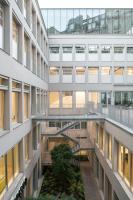 an external view of a building with a courtyard at Deskopolitan House in Paris